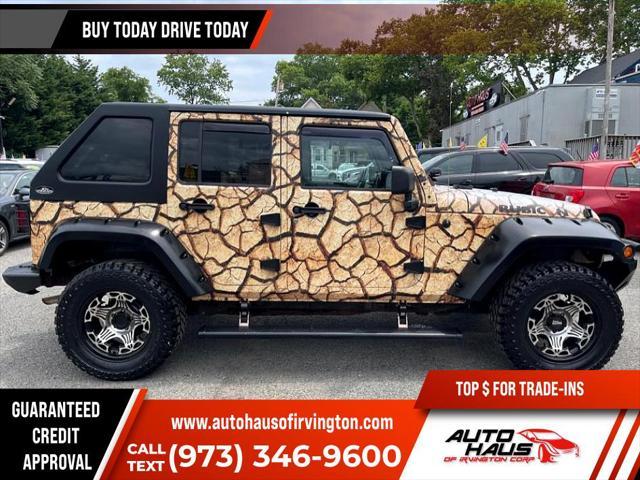 used 2011 Jeep Wrangler Unlimited car, priced at $16,995