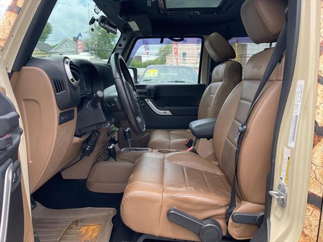 used 2011 Jeep Wrangler Unlimited car, priced at $16,995