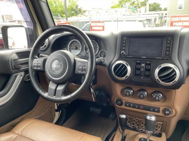 used 2011 Jeep Wrangler Unlimited car, priced at $16,995