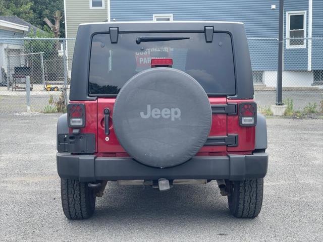 used 2013 Jeep Wrangler Unlimited car, priced at $17,995