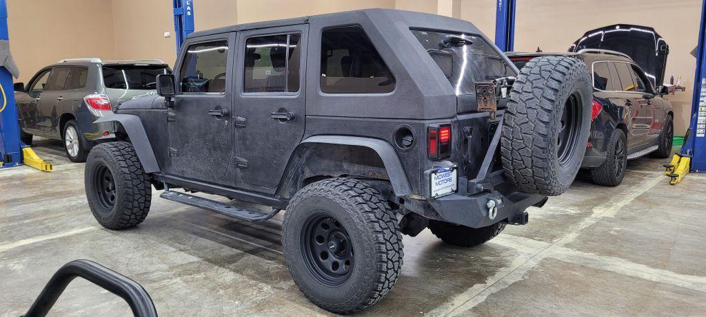 used 2009 Jeep Wrangler Unlimited car, priced at $22,599