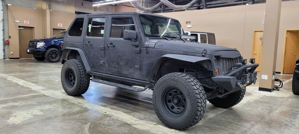 used 2009 Jeep Wrangler Unlimited car, priced at $22,599