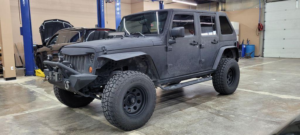 used 2009 Jeep Wrangler Unlimited car, priced at $22,599