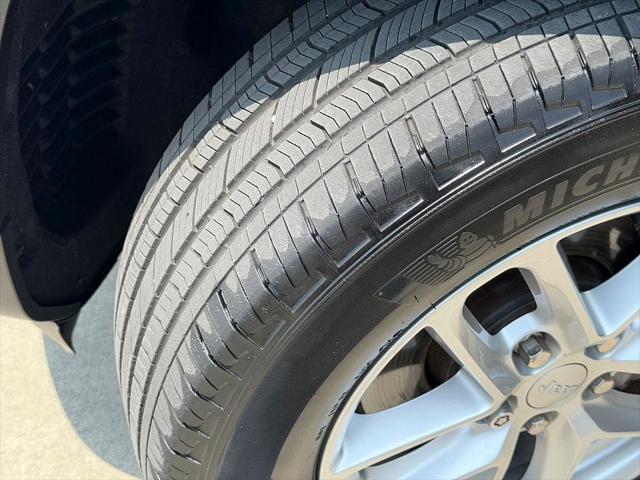 used 2023 Jeep Grand Cherokee L car, priced at $30,699