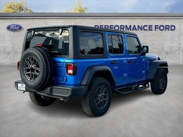 used 2024 Jeep Wrangler car, priced at $34,432