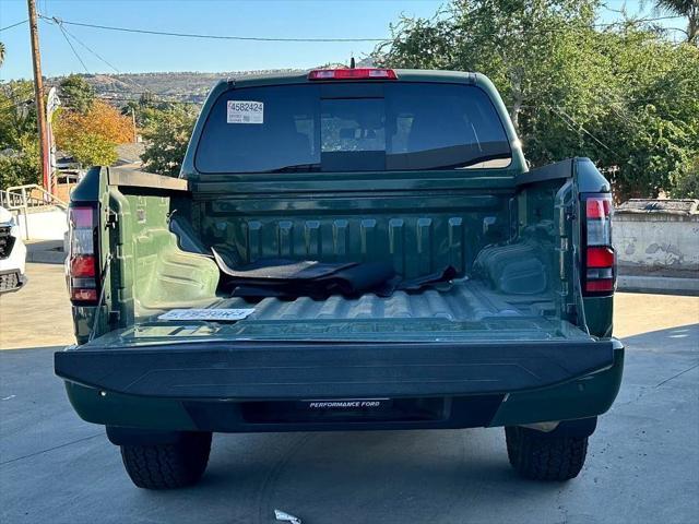 used 2024 Nissan Frontier car, priced at $31,300