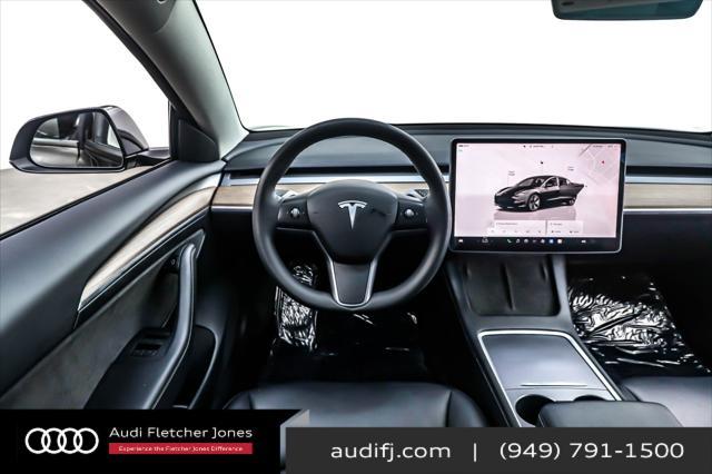 used 2023 Tesla Model 3 car, priced at $25,394