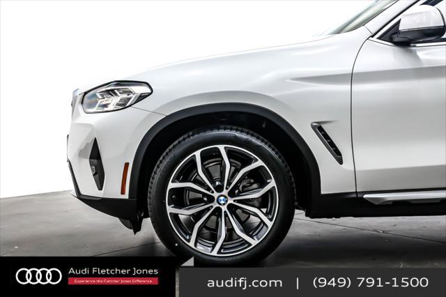 used 2023 BMW X4 car, priced at $44,894