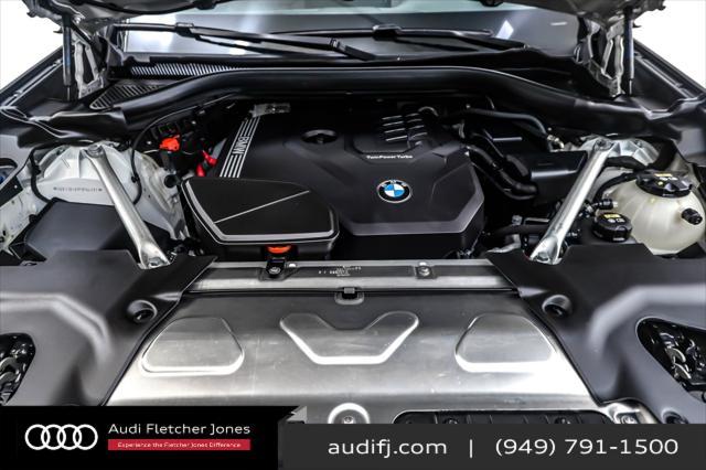 used 2023 BMW X4 car, priced at $44,894