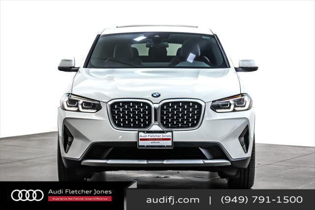 used 2023 BMW X4 car, priced at $44,894