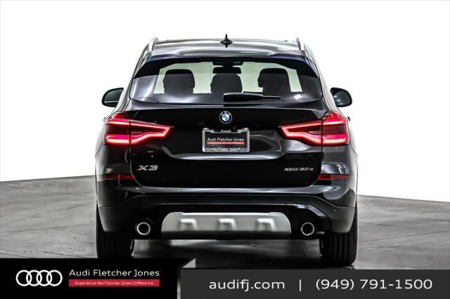 used 2021 BMW X3 PHEV car, priced at $30,893