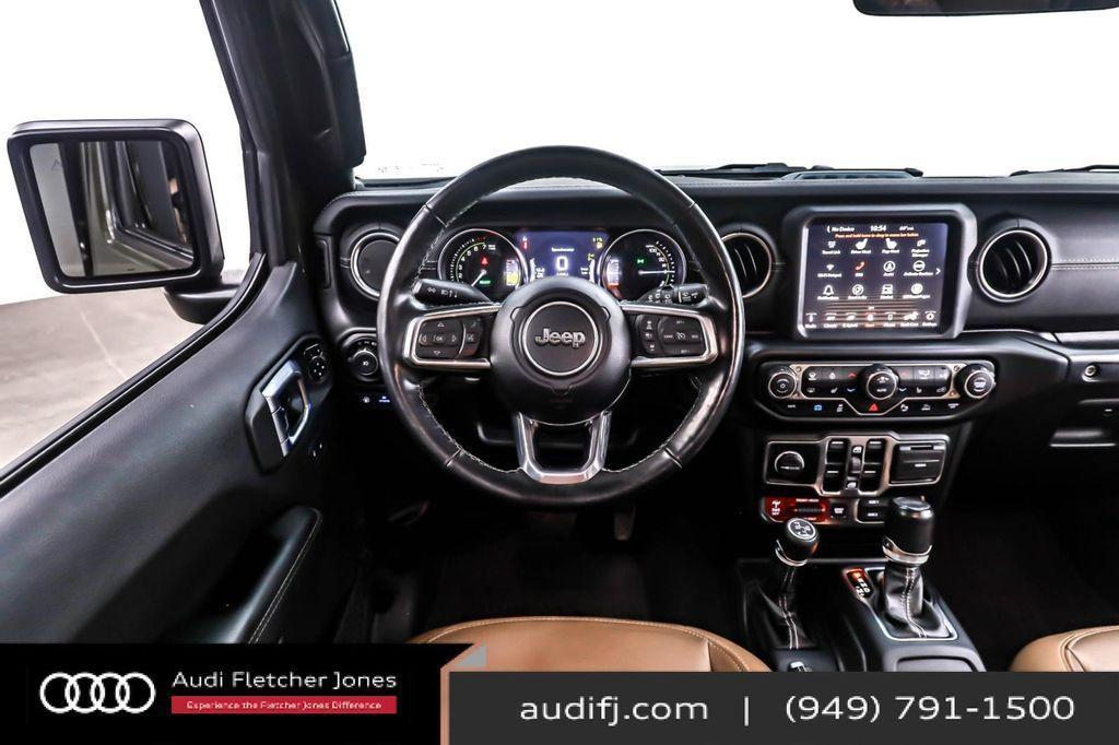 used 2023 Jeep Wrangler 4xe car, priced at $27,894