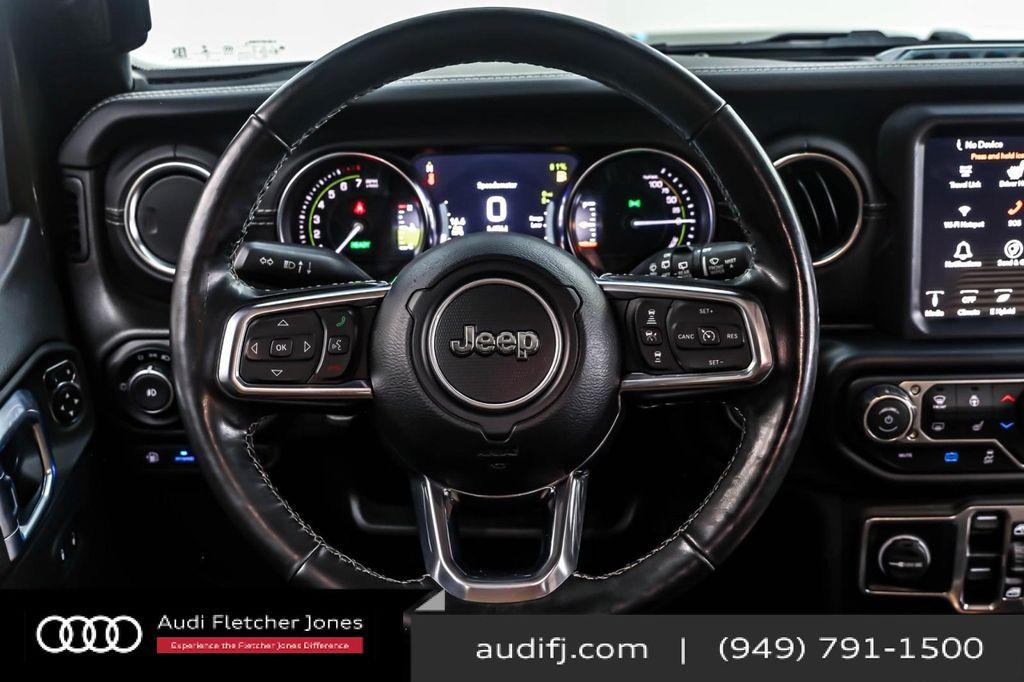 used 2023 Jeep Wrangler 4xe car, priced at $27,894