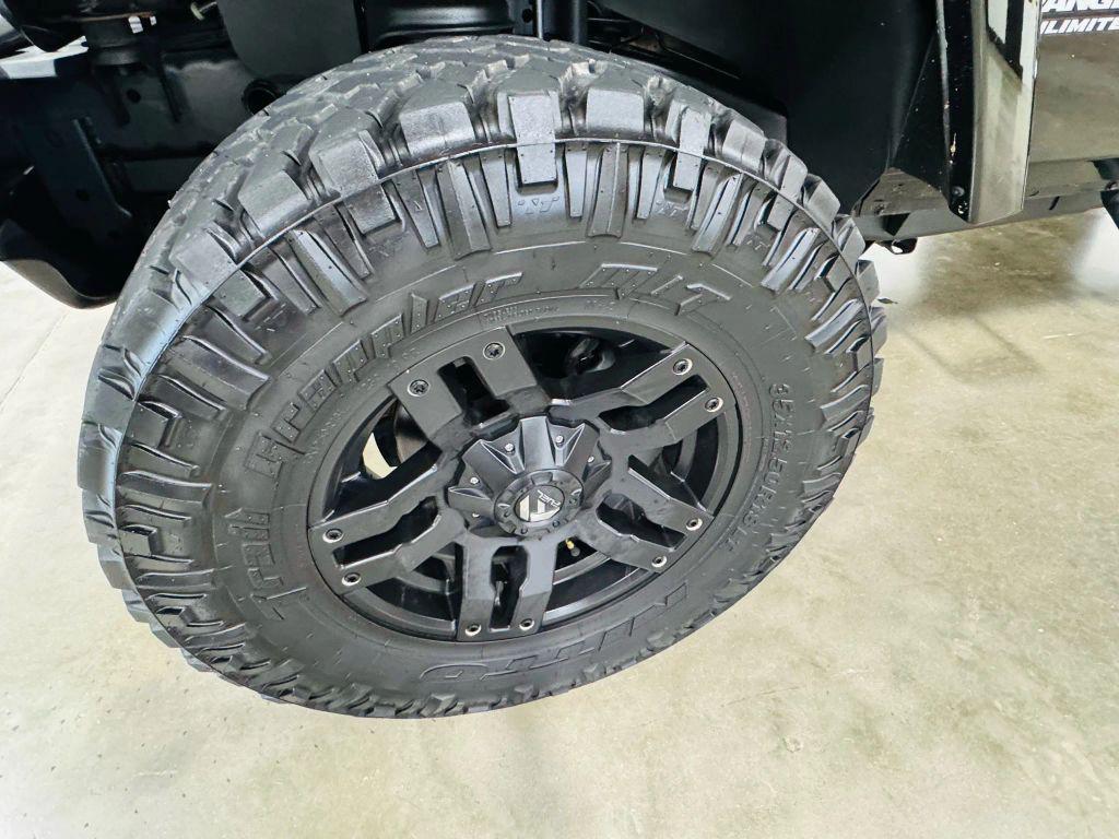 used 2012 Jeep Wrangler Unlimited car, priced at $18,450