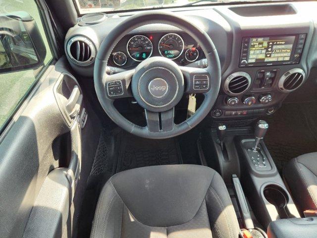 used 2015 Jeep Wrangler Unlimited car, priced at $21,886