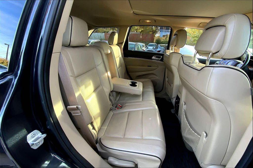 used 2014 Jeep Grand Cherokee car, priced at $13,499