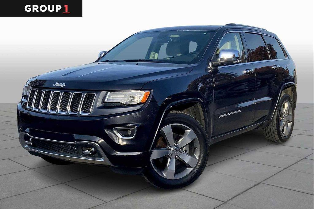 used 2014 Jeep Grand Cherokee car, priced at $13,499