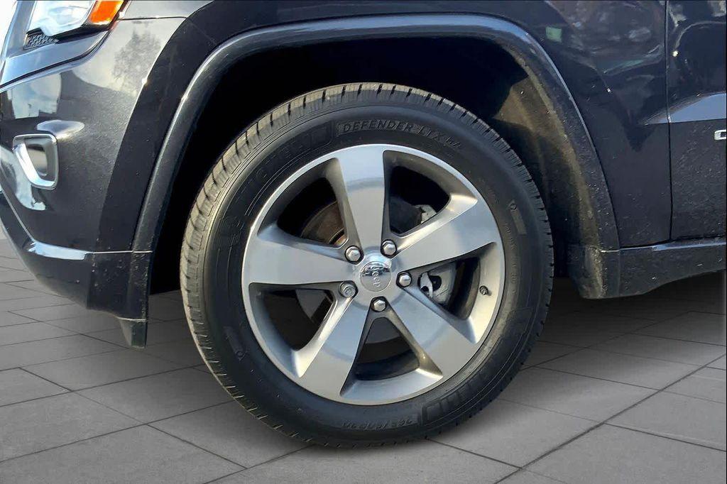 used 2014 Jeep Grand Cherokee car, priced at $13,499