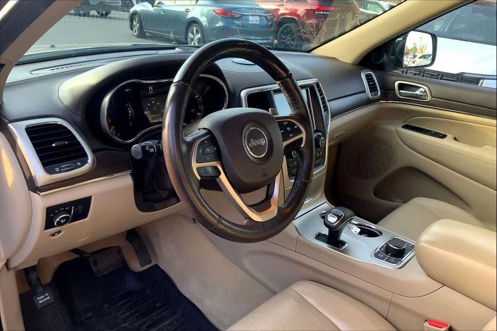 used 2014 Jeep Grand Cherokee car, priced at $13,499