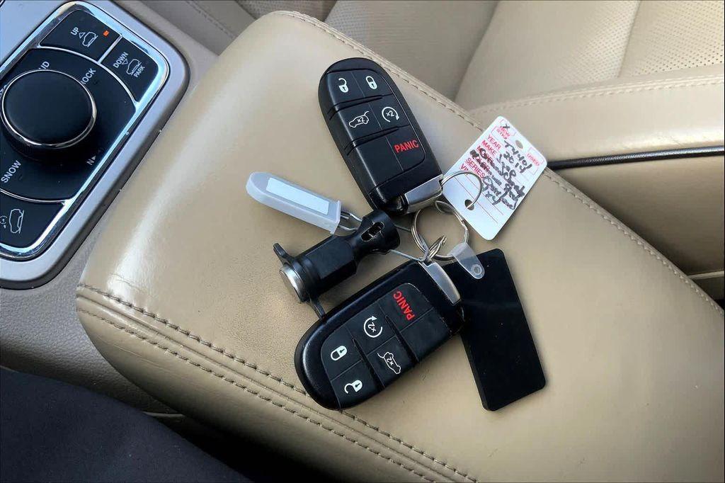 used 2014 Jeep Grand Cherokee car, priced at $13,499