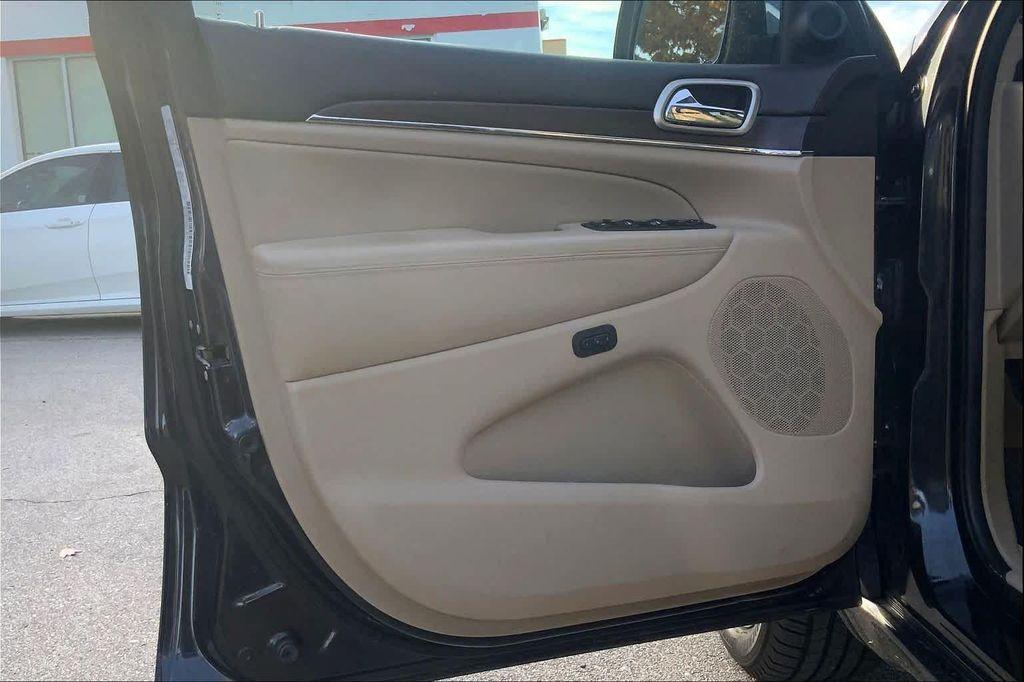 used 2014 Jeep Grand Cherokee car, priced at $13,499