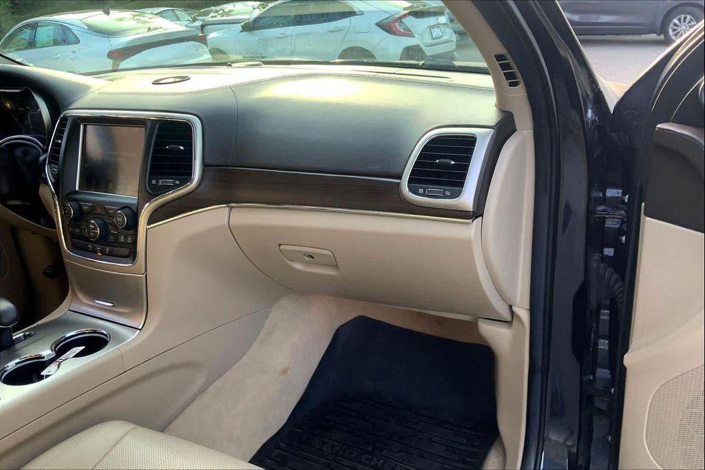used 2014 Jeep Grand Cherokee car, priced at $13,499
