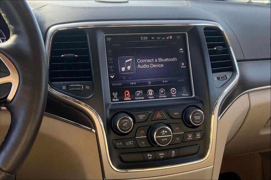 used 2014 Jeep Grand Cherokee car, priced at $13,499