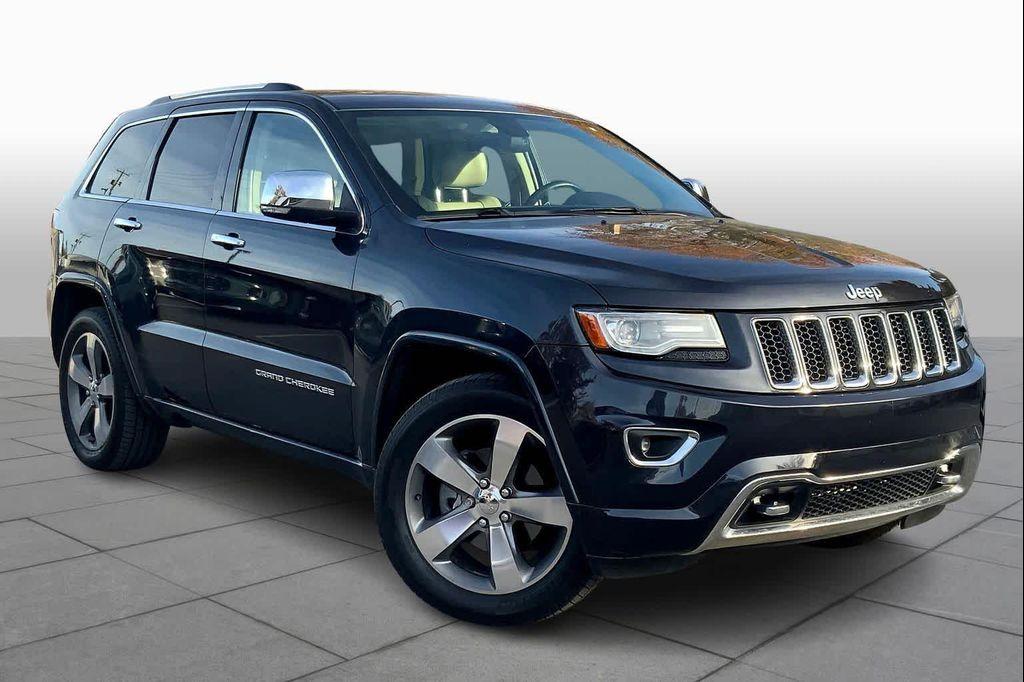 used 2014 Jeep Grand Cherokee car, priced at $13,499
