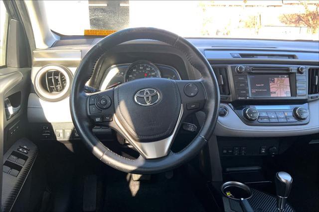 used 2015 Toyota RAV4 car, priced at $14,999