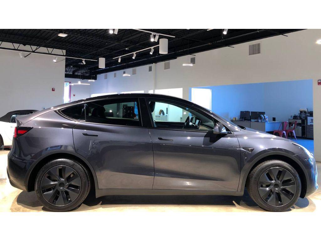 used 2024 Tesla Model Y car, priced at $34,444