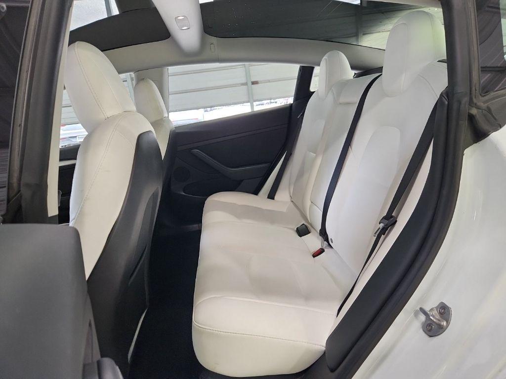 used 2023 Tesla Model 3 car, priced at $24,325