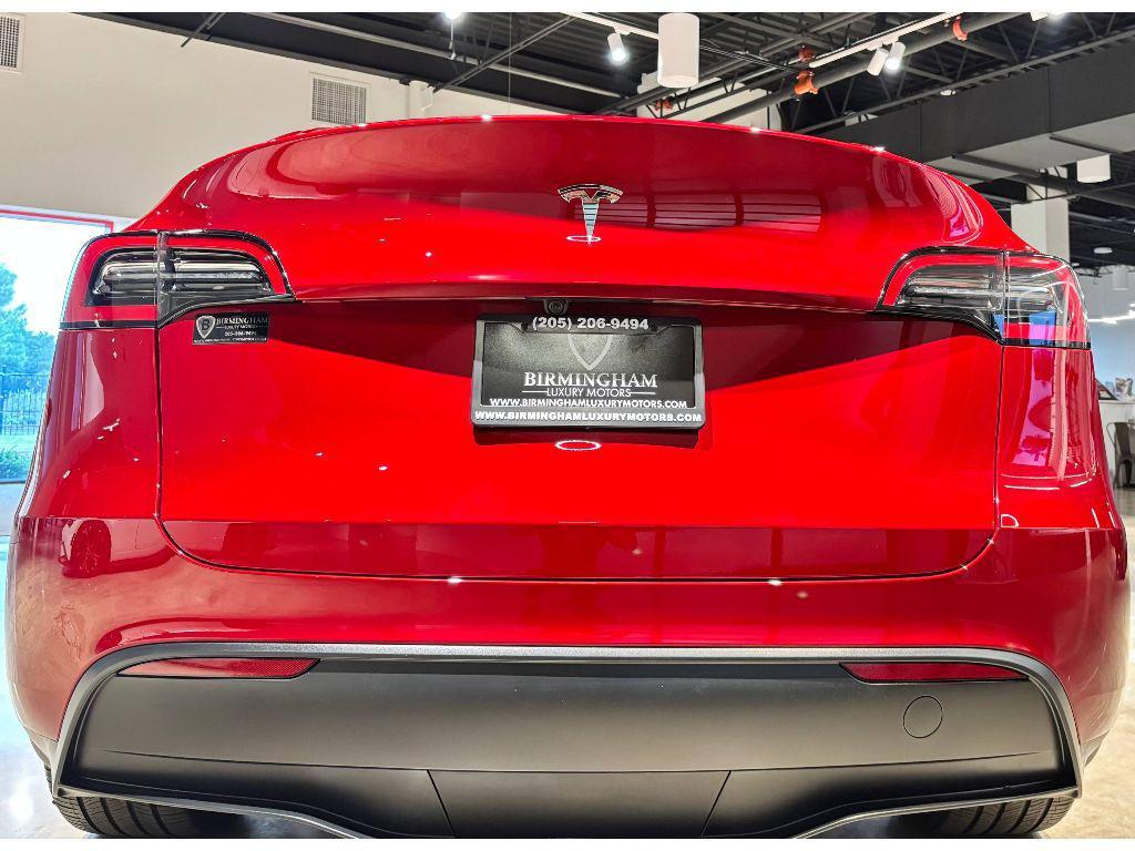 used 2025 Tesla Model Y car, priced at $35,999