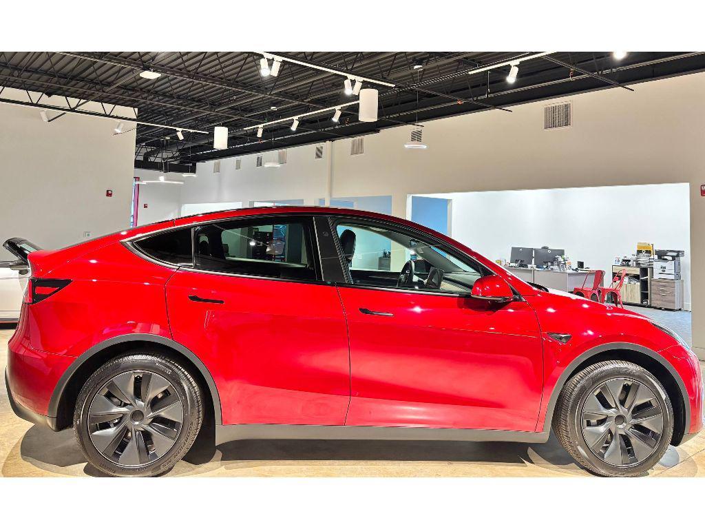 used 2025 Tesla Model Y car, priced at $35,999