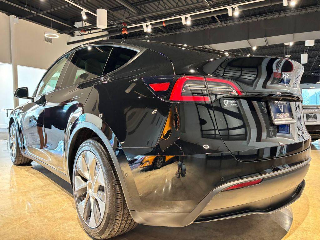 used 2021 Tesla Model Y car, priced at $16,999