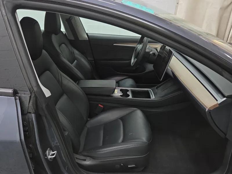 used 2023 Tesla Model 3 car, priced at $18,999