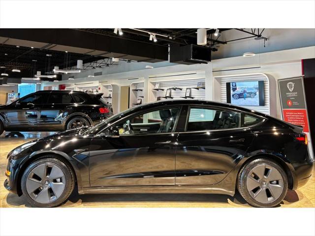 used 2022 Tesla Model 3 car, priced at $26,999