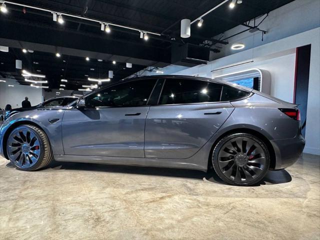 used 2022 Tesla Model 3 car, priced at $25,999