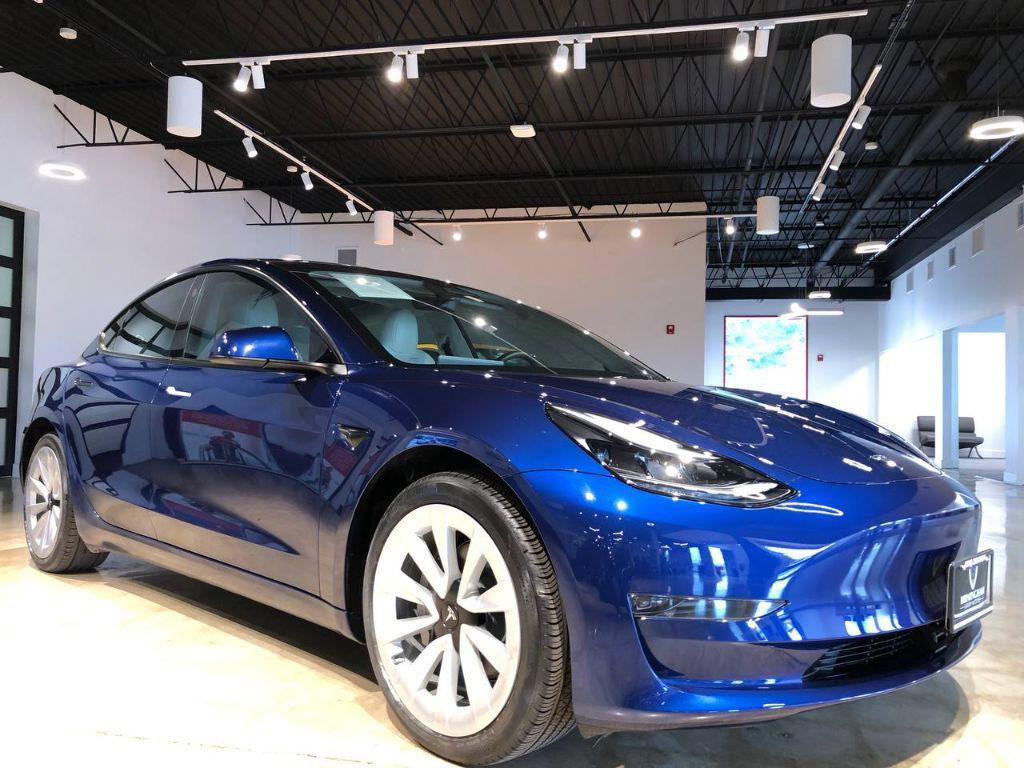 used 2023 Tesla Model 3 car, priced at $28,700