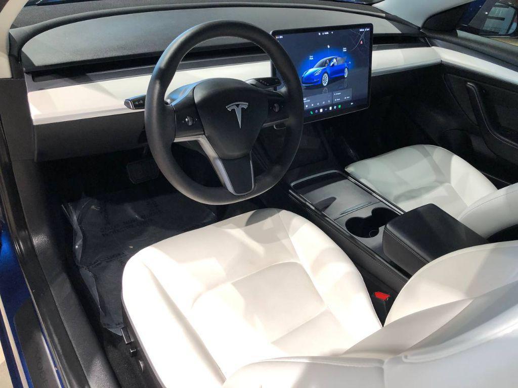 used 2023 Tesla Model 3 car, priced at $28,700