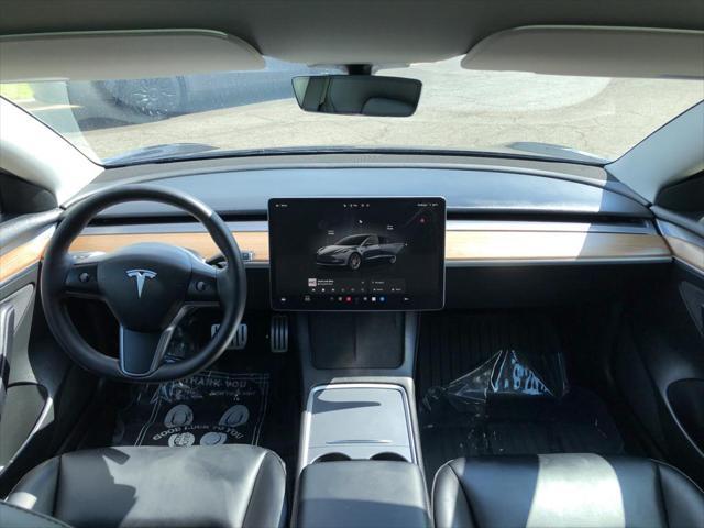 used 2023 Tesla Model 3 car, priced at $34,999