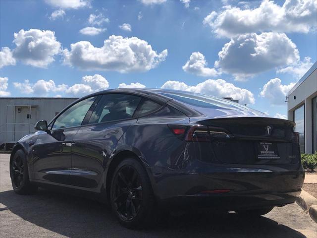 used 2023 Tesla Model 3 car, priced at $34,999