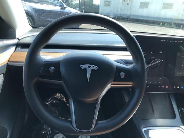 used 2023 Tesla Model 3 car, priced at $34,999