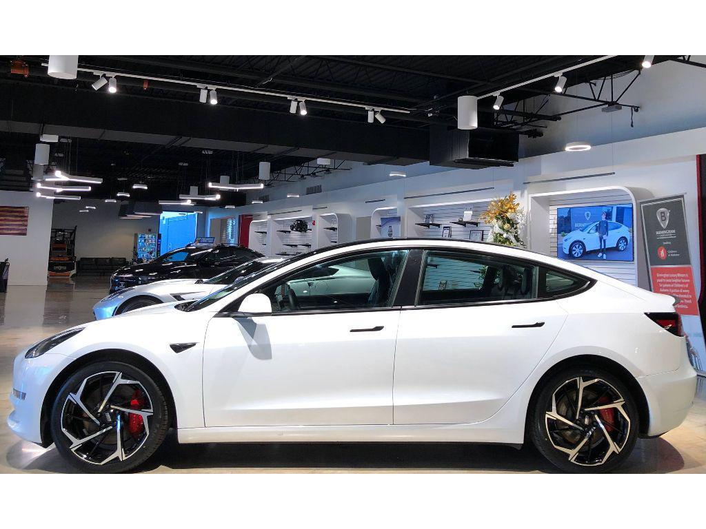 used 2023 Tesla Model 3 car, priced at $25,999