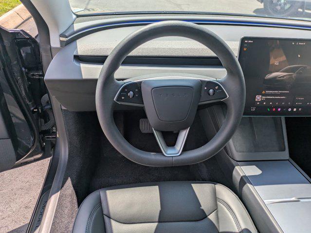 used 2024 Tesla Model 3 car, priced at $35,388