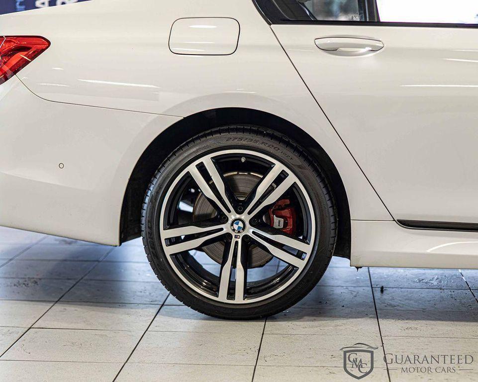 used 2018 BMW 750 car, priced at $31,225