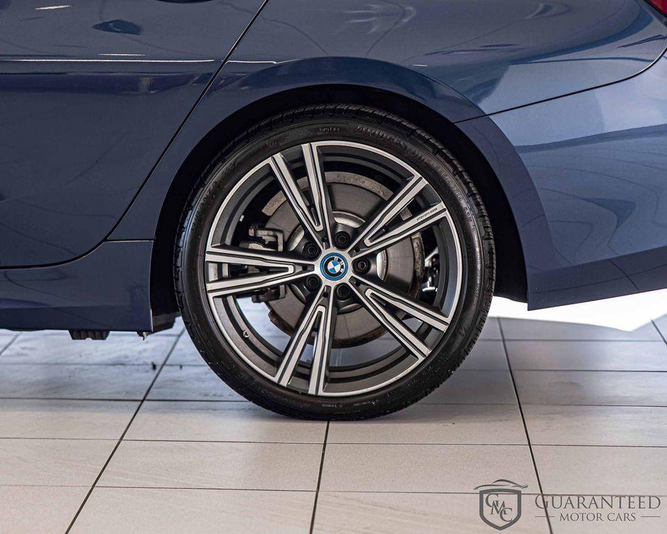 used 2023 BMW 330e car, priced at $38,930