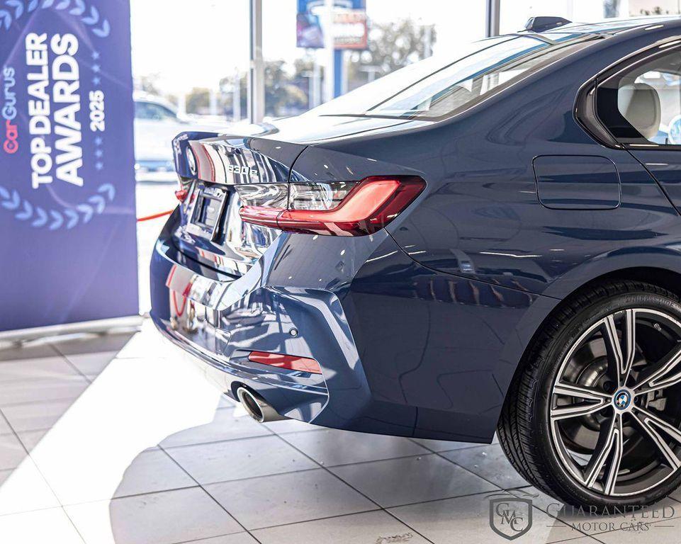 used 2023 BMW 330e car, priced at $38,930