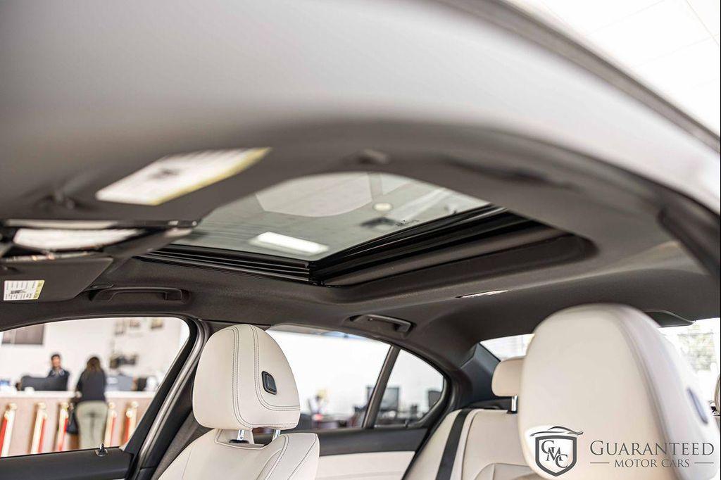 used 2023 BMW 330e car, priced at $38,930