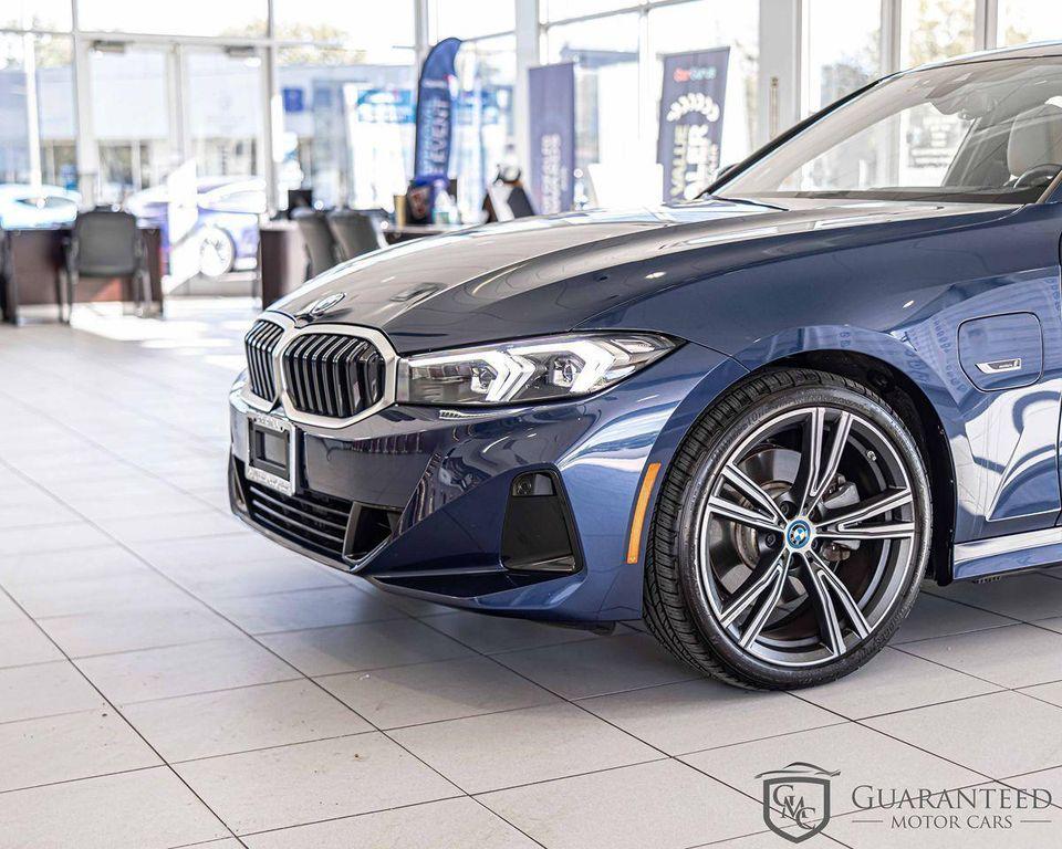 used 2023 BMW 330e car, priced at $38,930