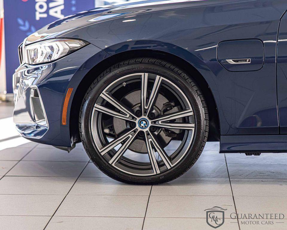 used 2023 BMW 330e car, priced at $38,930